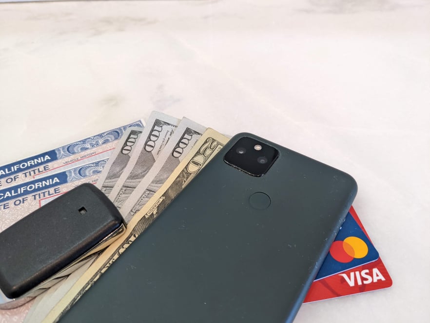 Phone, keys, and money